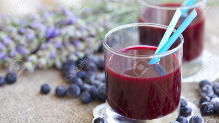 Blueberries juice in the glass.
