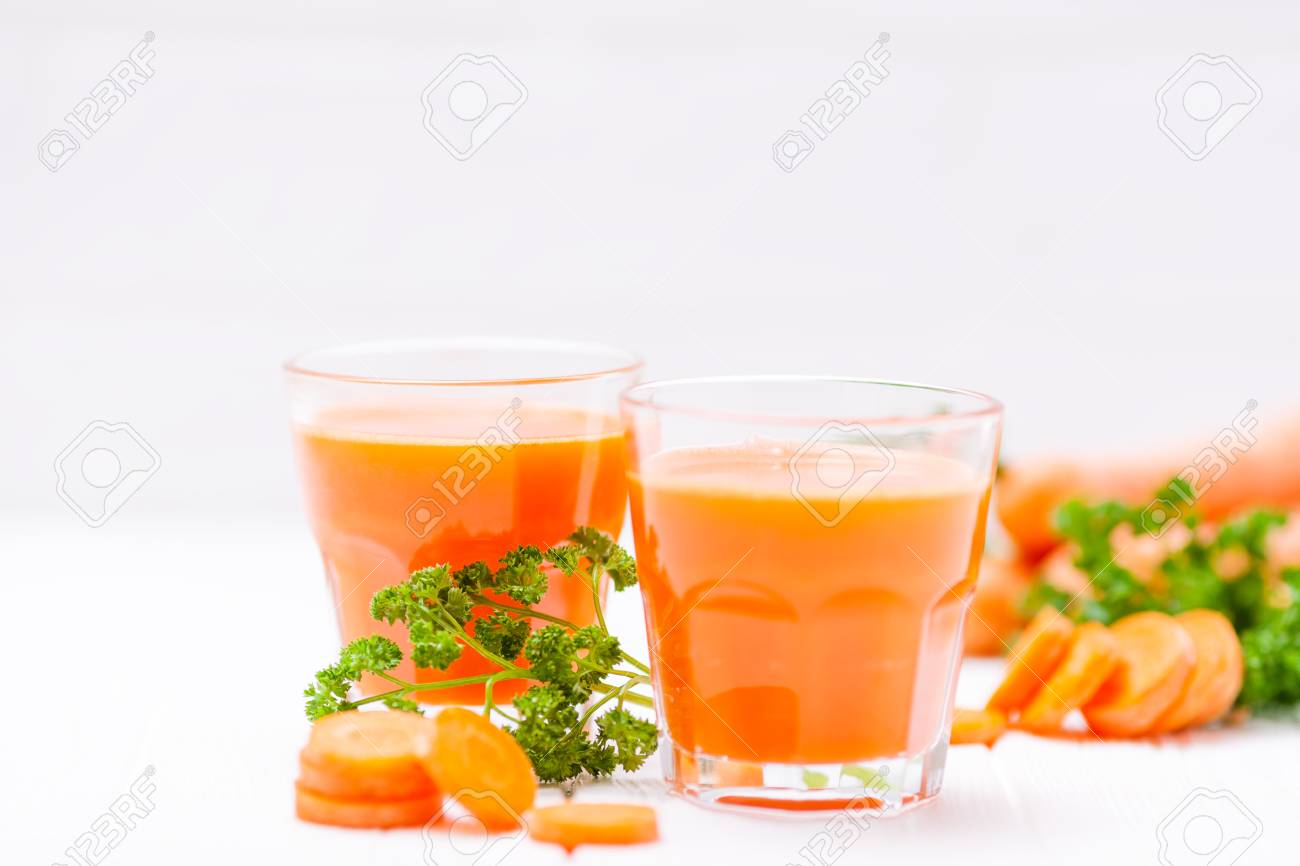 Carrot juice in beautiful glasses
